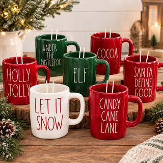 Pouring a candle into a red Christmas mug