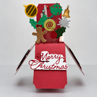 Handmade holiday box card with festive paper decorations by Manisha Mande