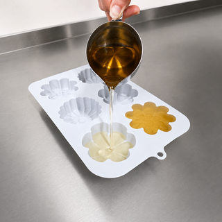 Pouring a shampoo bar