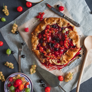 Homemade holiday berry galette with a golden crust and mixed berries