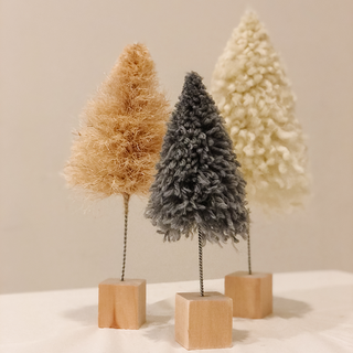 Three handmade bottle brush trees by Laura Cott